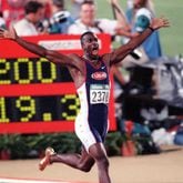 The one-word headline said "WHOOOOOOSH!," above this photo in 1996. Wearing golden shoes, Michael Johnson reacts as he realizes he has set a world record in the 200-meter event during the 1996 Summer Olympics in Atlanta. (AJC Staff Photo/Jonathan Newton)