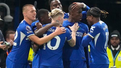 Chelsea's Nicolas Jackson, centre right, celebrates after scoring his side's second goal during the English Premier League soccer match between Chelsea and Tottenham Hotspur at Stamford Bridge stadium in London, Thursday, May 2, 2024. (AP Photo/Kirsty Wigglesworth)