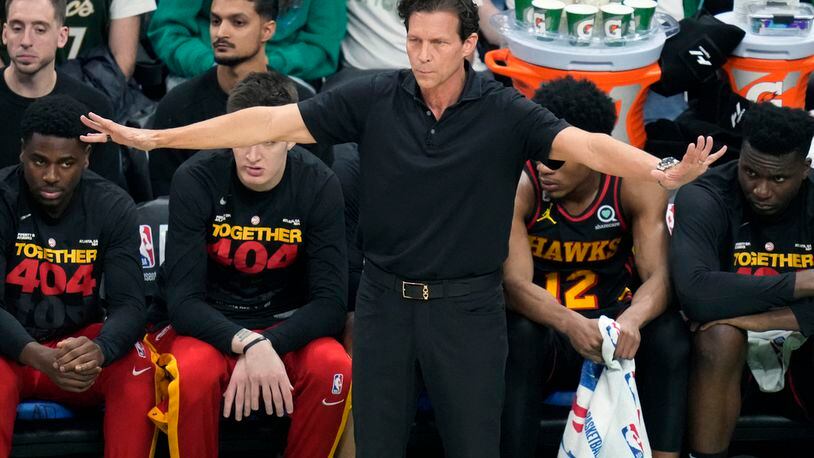 Hawks coach Quin Snyder calls to his players while facing the Boston Celtics during Game 2 in the first round of the NBA basketball playoffs, Tuesday, April 18, 2023, in Boston. (AP Photo/Charles Krupa)
