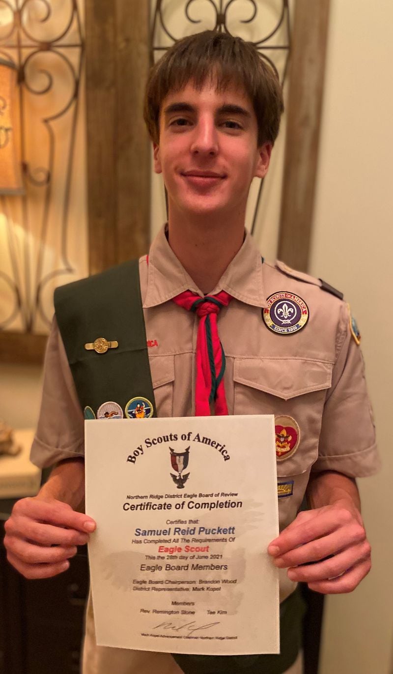 The Northern Ridge Boy Scout District (Cities of Roswell, Alpharetta, John’s Creek, Milton) announced Samuel Puckett, of Troop 430, passed his Board of Review on June 28 to become an Eagle Scout. Sponsored by St. David’s Episcopal Church, his project was the refurbishing of the driveway play area at the Sinclair House at St. David’s which included  replacing the basketball hoop, power-washing  the driveway and paint a new four-square court, design and build a Ball Rack and two benches.  In addition Samuel planted shrubs by the Basketball hoop that will be placed next to the basketball hoop.