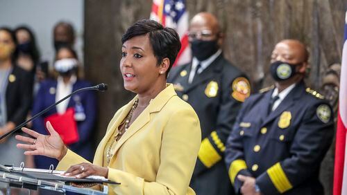 May 7, 2021 Atlanta:  Atlanta Mayor Keisha Lance-Bottoms held a press conference Friday, May 7, 2021 at Atlanta City Hall speaking about her decision not to run for a second term. In her first public appearance since announcing her decision to supporters Thursday night, Bottoms said her decision was guided by faith. “In the same way that it was very clear to me almost five years ago that I should run for mayor of Atlanta, it is abundantly clear to me today that it is time to pass the baton on to someone else,” Bottoms said at an emotional news conference at City Hall. She added that “the last three years have not been at all what I would have scripted for our city,” referencing a crippling cyber attack, a widening federal corruption investigation into the previous administration, the COVID-19 pandemic and civil unrest last year. Bottoms said she doesn’t know what’s next for her; she denied rumors that she or her husband Derek have taken jobs for Walgreens out of state. “I can’t get Derek to move two miles off Cascade Road,” she said. Bottoms, who was seen as a strong incumbent candidate despite a spike in violent crime, told friends and supporters Thursday evening she won’t seek a second term. She released a video and statement online a few hours later elaborating on her decision and reflecting on her time in office. “This is not something I woke up and decided yesterday,” Bottoms said Friday. “This is something I’ve been thinking about for a very long time.” (John Spink / John.Spink@ajc.com)