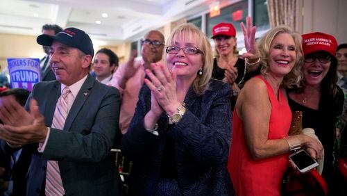 Supporters cheer as Republican presidential candidate Donald Trump speaks during a news conference at the Trump National Golf Club Westchester, Tuesday, June 7, 2016, in Briarcliff Manor, N.Y. ( Photo/Mary Altaffer)