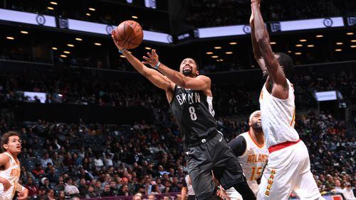 Spencer Dinwiddie of the Brooklyn Nets shoots the ball against the Atlanta Hawks on December 16, 2018 at Barclays Center in Brooklyn, New York. N