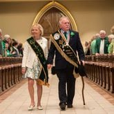 St. Patrick's Day Parade Committee Grand Marshal George Schwarz III and his wife Patricia Hodges Schwarz enter the Cathedral Basilica of St. John the Baptist for St. Patrick's Day Mass. (Photo Courtesy of Will Peebles)