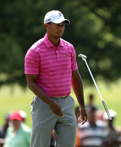 Woods, Rose start day in the lead