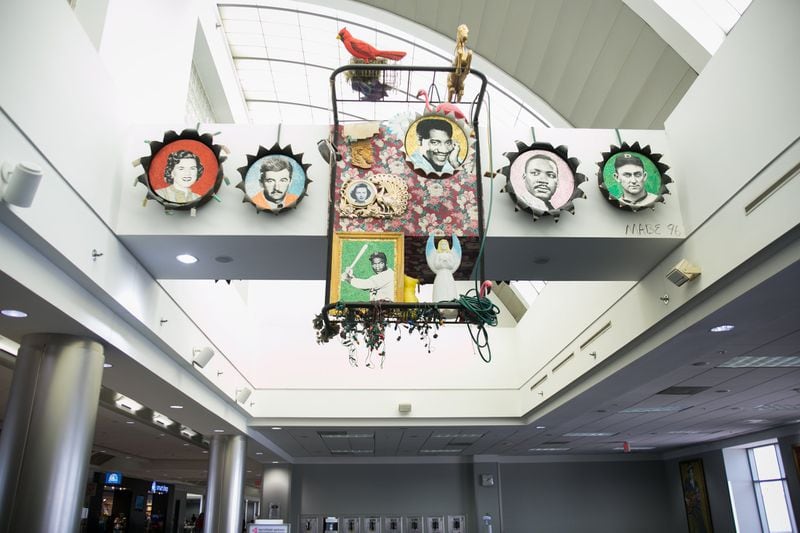 A work by Joni Mabe celebrating Southern icons and featuring portraits of William Faulkner and Ty Cobb, among others, is one of the many artworks that define Hartsfield-Jackson International Airport’s art program. CONTRIBUTED BY HARTSFIELD-JACKSON INTERNATIONAL AIRPORT