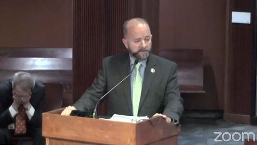 Andrew Turnage, executive director for the Georgia Access to Medical Cannabis Commission, speaks Monday about delays in awarding marijuana licenses to six companies in Georgia.