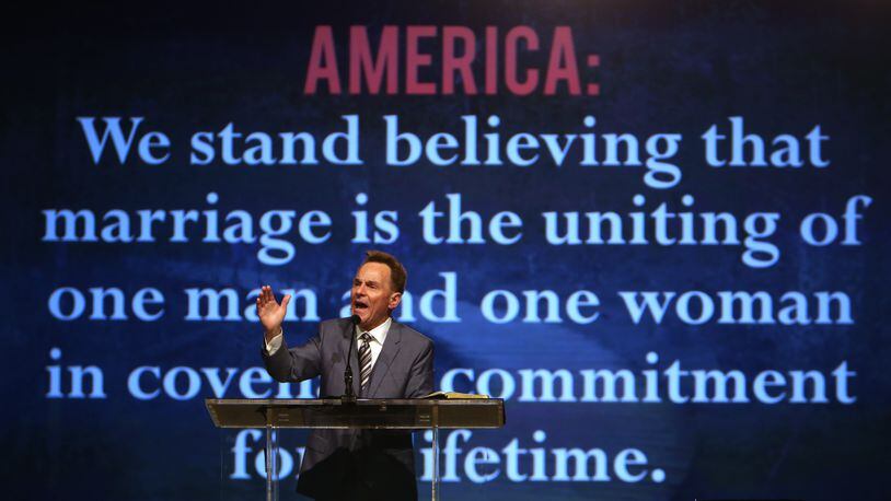 Pastor Ronnie Floyd, president of the Southern Baptist Convention, gives the presidential address to the Southern Baptist Convention at the Greater Columbus Convention Center, in Columbus, Ohio, June 16, 2015. Floyd exhorted members to stand united against same-sex marriage and vows that he will never officiate a same-sex union. (Eric Albrecht/Columbus Dispatch via AP)