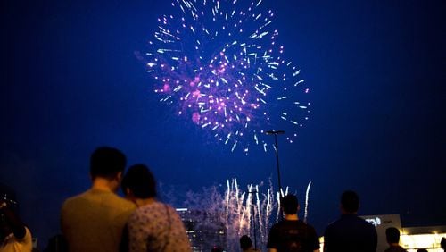Fireworks illuminate the skies over Lenox Square during the annual July 4th event in 2015. BRANDEN CAMP/SPECIAL