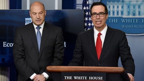 Treasury Secretary Steven Mnuchin, right, and Director of the National Economic Council Gary Cohn discuss the goals and feasibility of President Trump's tax reform plan in the Press Briefing Room of the White House Wednesday, April 26, 2017 in Washington, D.C. (Olivier Douliery/Abaca Press/TNS)