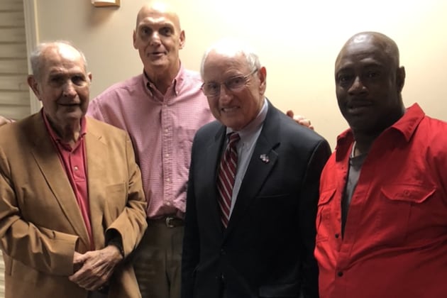 Retired Coffee football coach Bonwell Royal (left), who died May 29, is seen here  with two of his best players, Joel "Cowboy" Parrish (second from left) and Andre "Pulpwood" Smith (right) along with their college coach, Georgia's Vince Dooley.
