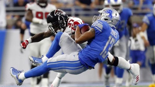 Detroit Lions wide receiver T.J. Jones (13), defended by Atlanta Falcons free safety Ricardo Allen (37), makes a catch during the second half of an NFL football game, Sunday, Sept. 24, 2017, in Detroit. (AP Photo/Paul Sancya)