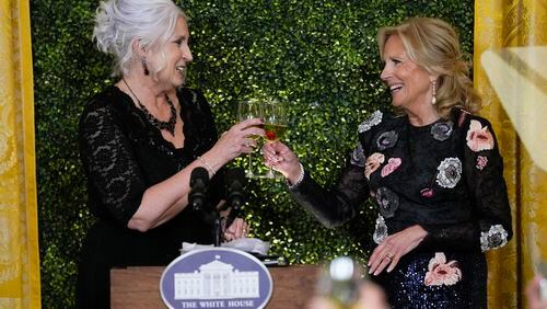Missy Testerman, the 2024 National Teacher of the Year toasts with first lady Jill Biden during a State Dinner at the White House in Washington, Thursday, May 2, 2024, to honor the 2024 National Teacher of the Year and other teachers from across the United States. (AP Photo/Susan Walsh)