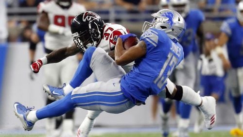 Detroit Lions wide receiver T.J. Jones (13), defended by Atlanta Falcons free safety Ricardo Allen (37), makes a catch during the second half of an NFL football game, Sunday, Sept. 24, 2017, in Detroit. (AP Photo/Paul Sancya)