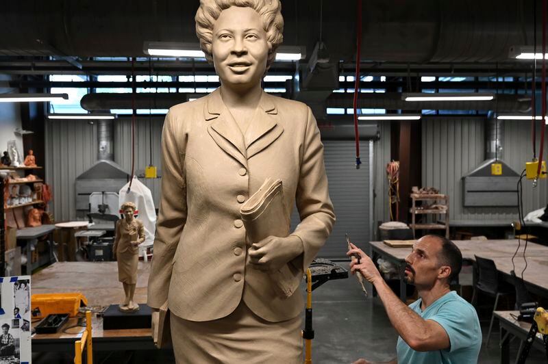 Benjamin Victor works on his sculpture of Daisy Gatson Bates at the Windgate Center of Art and Design at the The University of Arkansas at Little Rock campus on Monday, April 25, 2022, in Little Rock, Ark. The statue will be placed in the Statuary Hall in the United States Capitol when it is completed. (Stephen Swofford/Arkansas Democrat-Gazette via AP)