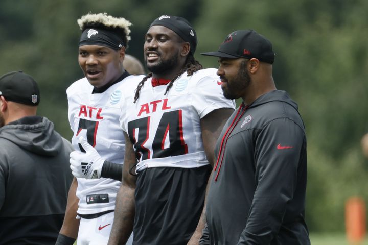 Atlanta Falcons linebacker Mikal Walker (3) speaks with Falcons wide receiver Cordarrelle Patterson (84) and running back coach Michael Pitre during a joint training camp with the Jacksonville Jaguars at the Falcons Practice Facility on Wednesday, August 24, 2022, in Flowery Branch, Ga. Miguel Martinez / miguel.martinezjimenez@ajc.com