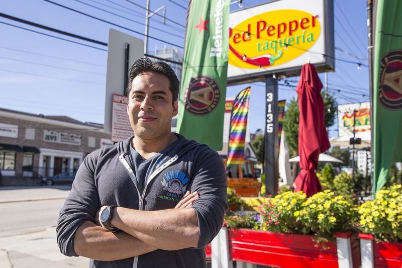 10/17/2019 — Atlanta, Georgia — Buckhead Red Pepper Taqueria Assistant Manager Antonio Cruz poses for a portrait outside of the Buckhead restaurant in Atlanta, Thursday, October 17, 2019. The restaurant is outfitted with a large number of surveillance cameras. (Alyssa Pointer/Atlanta Journal Constitution)