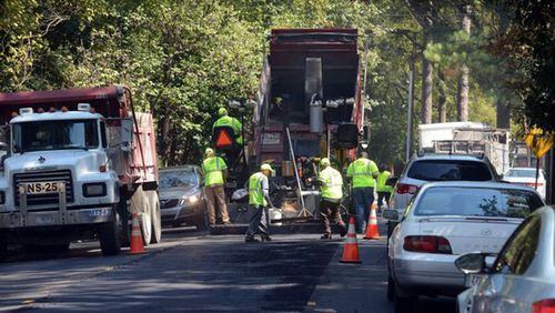 Woodstock has approved a list of five streets to be resurfaced this spring, using state grant monies. AJC FILE