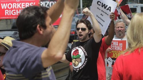 Protesters from the Metro Atlanta Democratic Socialists of America in this 2011 file photo. BOB ANDRES / BANDRES@AJC.COM
