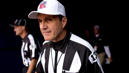 NFL referee Pete Morelli walks out of the tunnel before a game.