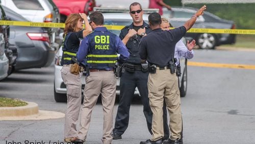 The Georgia Bureau of Investigation was on the scene of a fatal shooting at a Decatur apartment complex on Wednesday. JOHN SPINK / JSPINK@AJC.COM