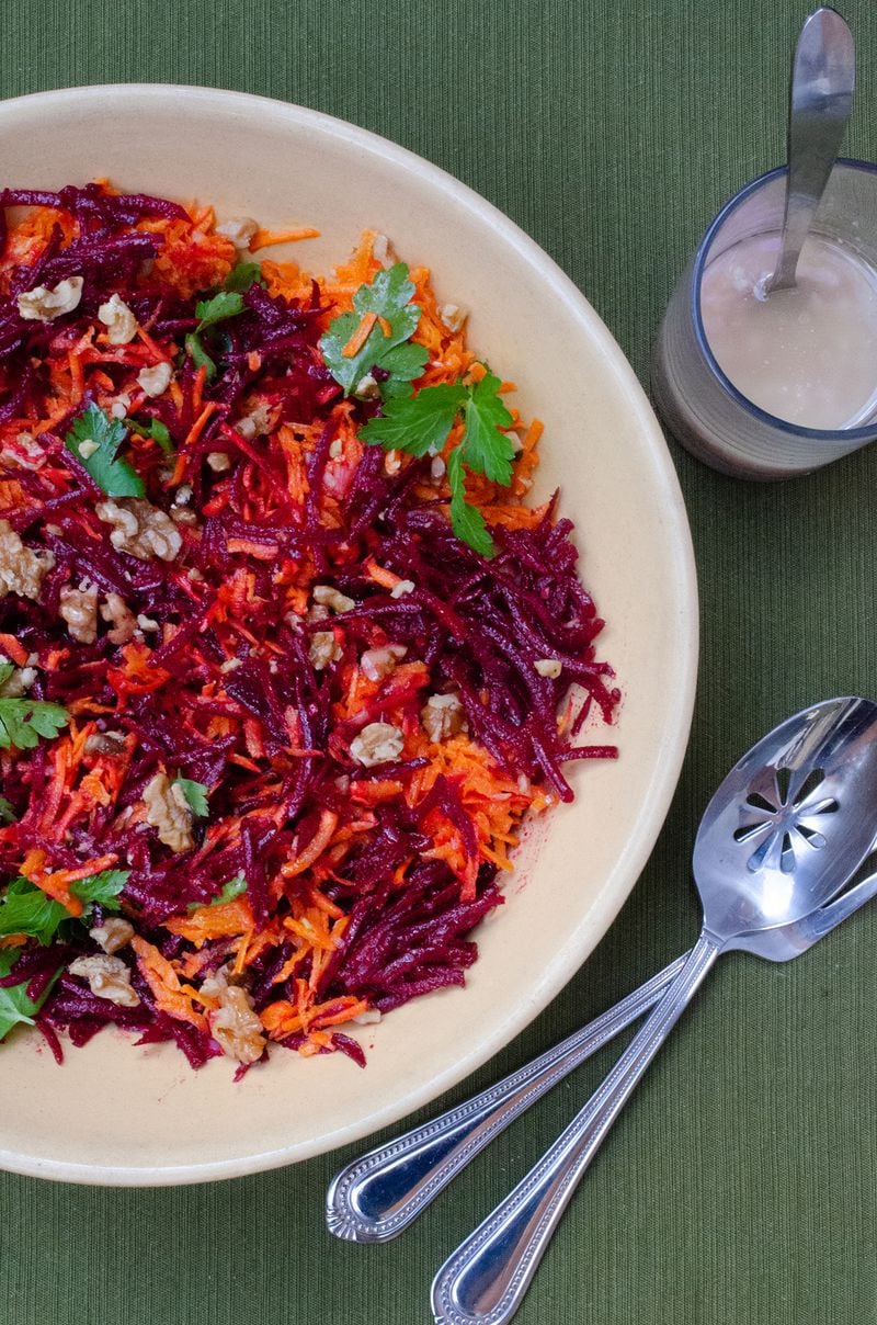Bold in color, this vibrant Carrot and Beet Salad with Lemon Vinaigrette pops with flavor. (Virginia Willis for The Atlanta Journal-Constitution)