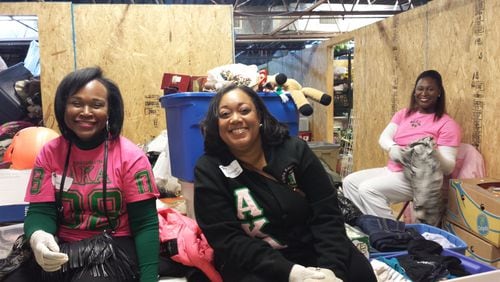 Charmagne Helton (right) with her graduate chapter last month at North Fulton Community Charities during their Martin Luther King Jr. Day of Service. They sorted clothes, worked in the food pantry and volunteered in the thrift store.