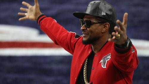 HOUSTON, TX - FEBRUARY 05: Usher looks on prior to Super Bowl 51 between the Atlanta Falcons and the New England Patriots at NRG Stadium on February 5, 2017 in Houston, Texas. (Photo by Patrick Smith/Getty Images)