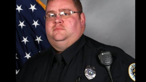 A Nashville police officer was listed in stable condition Friday after being shot in the morning at a Dollar General store parking lot, according to officials. The officer was identified by the Nashville Metropolitan Police Department as Josh Baker. (Nashville Metropolitan Police Department)
