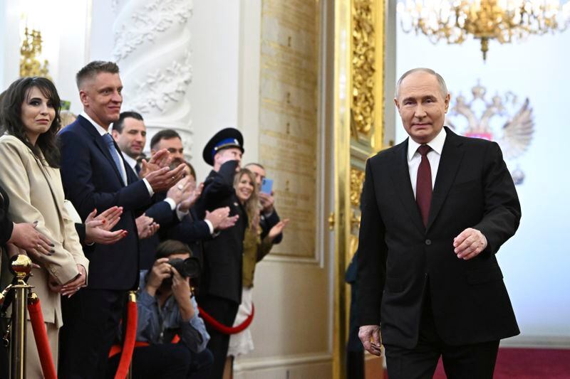 Vladimir Putin arrives for an inauguration ceremony to begin his fifth term as Russian president in the Grand Kremlin Palace in Moscow, Russia, Tuesday, May 7, 2024. (Sergei Bobylev, Sputnik, Kremlin Pool Photo via AP)