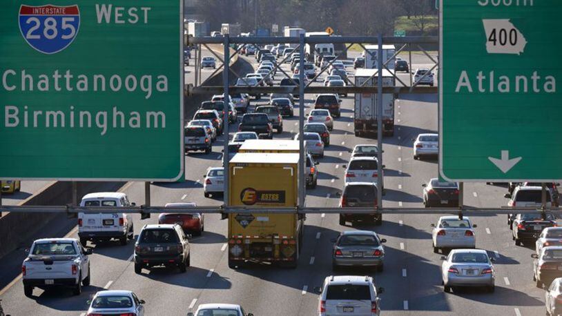 Weather permitting, much of the right shoulder of westbound I-285 between Ga. 400 and Roswell Road in the Sandy Springs area is scheduled to disappear Friday, March 1, as crews begin work on collector-distributor lanes for the reconstructed interchange. AJC FILE