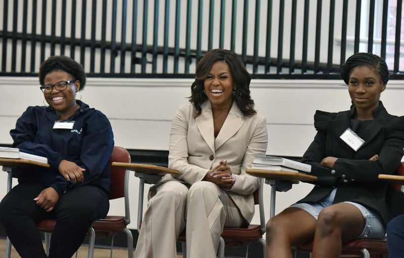 Former first lady Michelle Obama reacts as she meets with students from Spelman College and Morehouse College ahead of her book tour event later in the evening at State Farm Arena Saturday night. She was at Giles Hall on the Spelman College campus on Saturday, May 11, 2019. The students spent this past semester studying Becoming as a foundational text of their political science class “Black Women: Developing Public Leadership Skills.” HYOSUB SHIN / HSHIN@AJC.COM