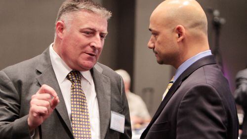 Doraville Police Chief John King (seen in this 2012 photo on left) was named to replace suspended Georgia Insurance Commissioner Jim Beck. Photo: Miguel Martinez/Mundo Hispanico