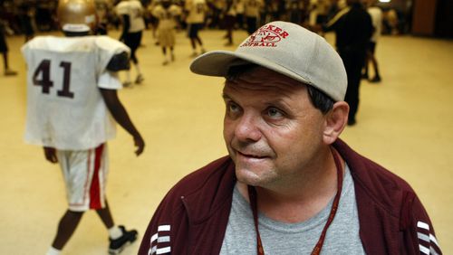 Bud King at a 2009 Tucker High School football practice. King, who had autism, was a walking encyclopedia of Tucker players, teams and coaches. He helped out the high school's coaches for decades. He was found dead March 2. Curtis Compton, ccompton@ajc.com