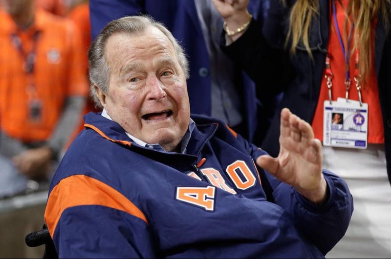 Former United States President George H. W. Bush prepares to throw out the ceremonial first pitch before game five of the 2017 World Series between the Houston Astros and the Los Angeles Dodgers at Minute Maid Park on October 29, 2017 in Houston, Texas.