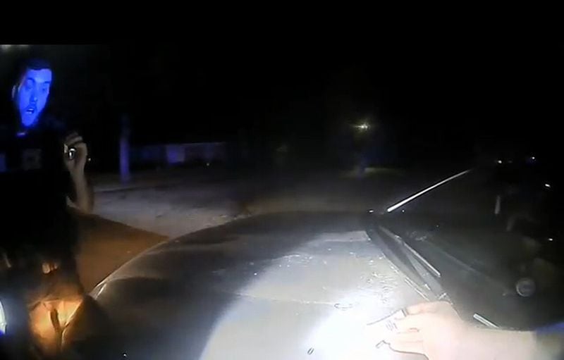 Officers were surprised and even giddy when a field test kit said that a substance on the hood of a college athlete’s car was cocaine. But it wasn’t. (credit: Saluda County Sheriff’s Office video)