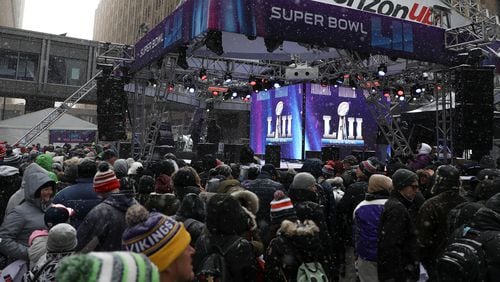 Fans make their way through the Nicollet Mall during the Super Bowl Live event Feb. 3, 2018 in Minneapolis.