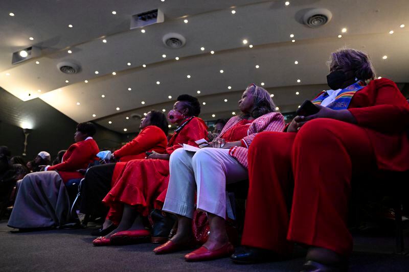 Alumni members of Delta Sigma Theta sorority watch Rev. Gina Stewart preach during church service at Rankin Chapel, Sunday, April 7, 2024, in Washington. Throughout its long history, the Black Church in America has, for the most part, been a patriarchal institution. Now, more Black women are taking on high-profile leadership roles. But the founder of Women of Color in Ministry estimates that less than one in 10 Black Protestant congregations are led by a woman. “I would hope that we can knock down some of those barriers so that their journey would be just a little bit easier,” said Stewart. (AP Photo/Terrance Williams)