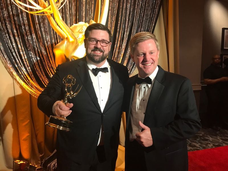 Photojournalist Eric Carlton with Adam Murphy of CBS46 afer winning for best spot news story regarding coverage in the aftermath of a tornado. Murphy won three Emmys in total. 