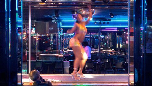 A 2006 file photo of a dancer at the Blue Flame Lounge on Bankhead Highway area. (Rich Addicks/AJC file photo)