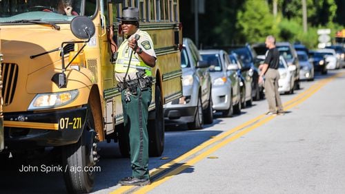 There is heavy traffic at Lithia Springs High School after a teacher shot himself on campus, school officials said. Classes have been canceled. JOHN SPINK / JSPINK@AJC.COM