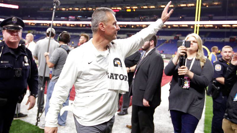 Ohio State head coach Urban Meyer walks off the field early Sunday, Dec. 2, 2018, after defeating Northwestern in the Big Ten championship NCAA college football game in Indianapolis. Ohio State won 45-24.