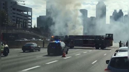 Authorities responded to a car fire that temporarily blocked several southbound lanes of the Downtown Connector.
