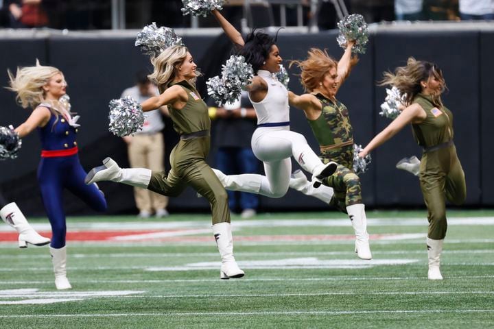 Falcons cheerleaders perform during a break in the third quarter Sunday. The Chargers defeated the Falcons 20-17 in Atlanta. (Miguel Martinez / miguel.martinezjimenez@ajc.com)