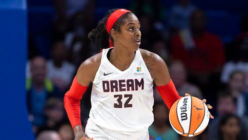 Atlanta Dream forward Cheyenne Parker (32) defends during a WNBA basketball game against the Dallas Wings, Saturday, May 7, 2022, in Arlington, Texas. Atlanta won 66-59. (AP Photo/Brandon Wade)