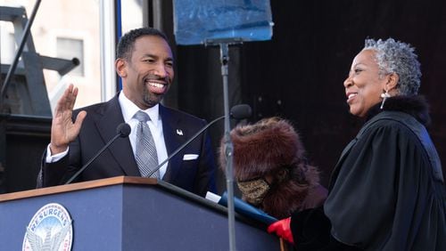 Andre Dickens takes the oath of office as he is sworn in as Mayor of Atlanta during his inauguration ceremony at Georgia Tech on Monday, Jan. 3. Dickens has pledged to take on the issue of affordable housing in Atlanta and make real changes during his first 100 days in office. Ben Gray for The Atlanta Journal-Constitution