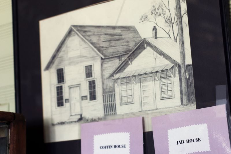 A sketch of the jail and coffin house of Colbert is on display in the city's small history museum located at City Hall. The building is no longer standing. Colbert jail is where Lent Shaw was held when he was arrested on April 10, 1936, accused of attacking a white woman.