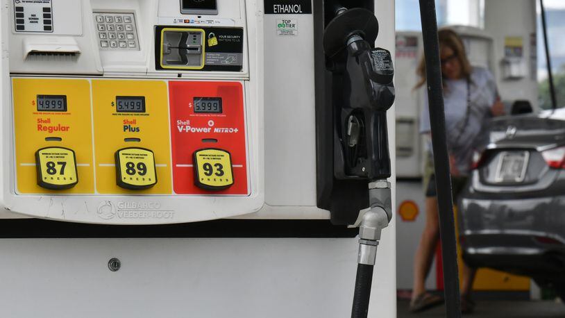 Gov. Brian Kemp on Thursday extended the suspension of the state's tax on motor fuel, this time until Oct. 12. The average price for a gallon of gas in the U.S. on Thursday was $3.83, according to AAA. In Georgia, the price was $3.37, down from $4.33 on July 1. (Hyosub Shin / Hyosub.Shin@ajc.com)