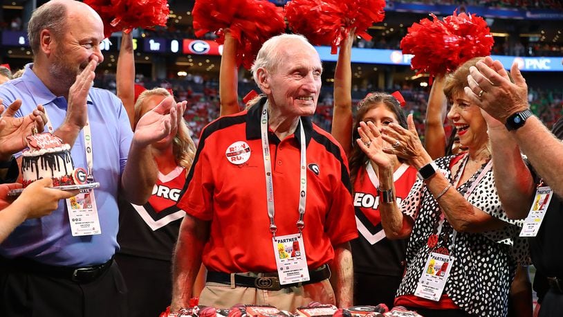 Former Georgia head coach Vince Dooley and his wife Barbara celebrate his 90th birthday with an on-field celebration before Georgia played Oregon on Saturday, Sept. 3, 2022, in Atlanta.   “Curtis Compton / Curtis Compton@ajc.com