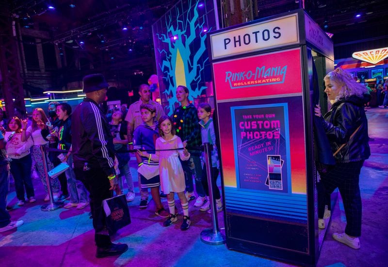 "Stranger Things: The Experience" at Pullman Yards ends in the Mix-Tape lounge where photo booths, arcade games, pizza, ice cream, cocktails, merchandise and photo opportunities are available.  (Jenni Girtman for The Atlanta Journal-Constitution)